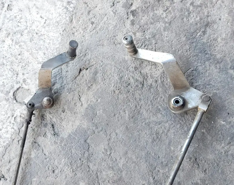Foot control brackets with rods